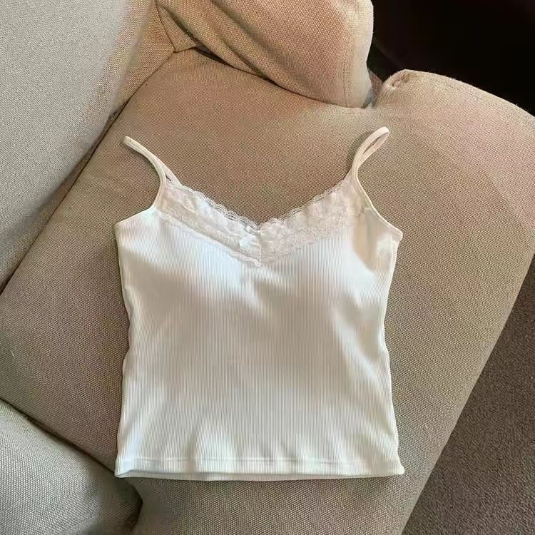 The pure and elegant lace halter vest for women, with a bra pad and a bow, is sexy, versatile, and form-fitting. It can be worn as an outer layer or as an inner layer with a base top undefined
