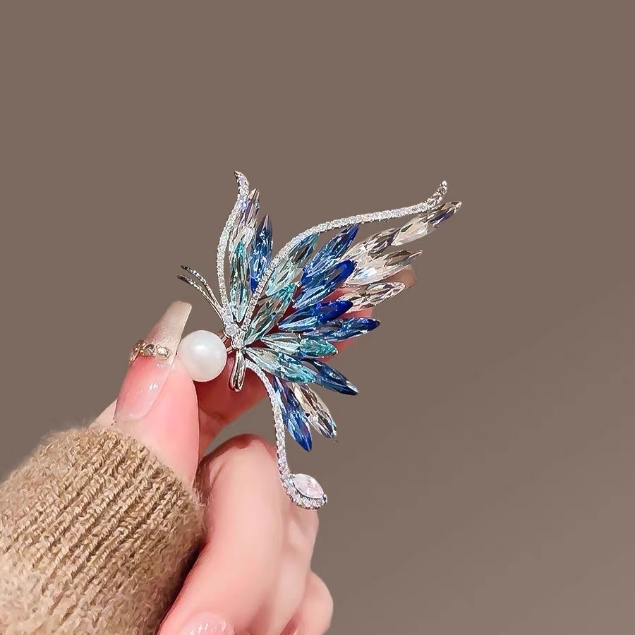 Butterfly cartoon brooches, pins, clothes, accessories, silver and blue coats, sweaters, skirts, evening gowns