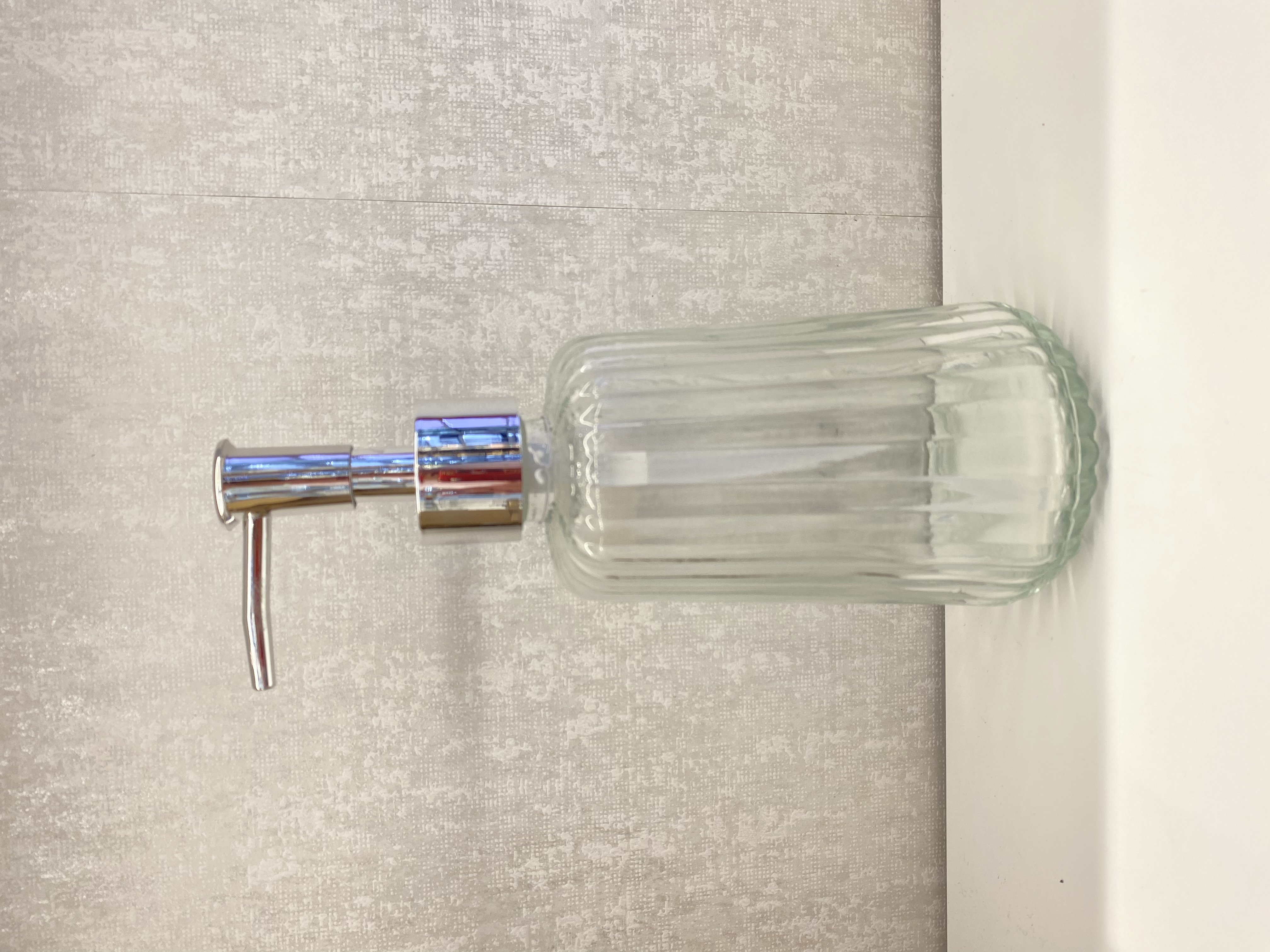 Glass hand sanitizer is bottled separately