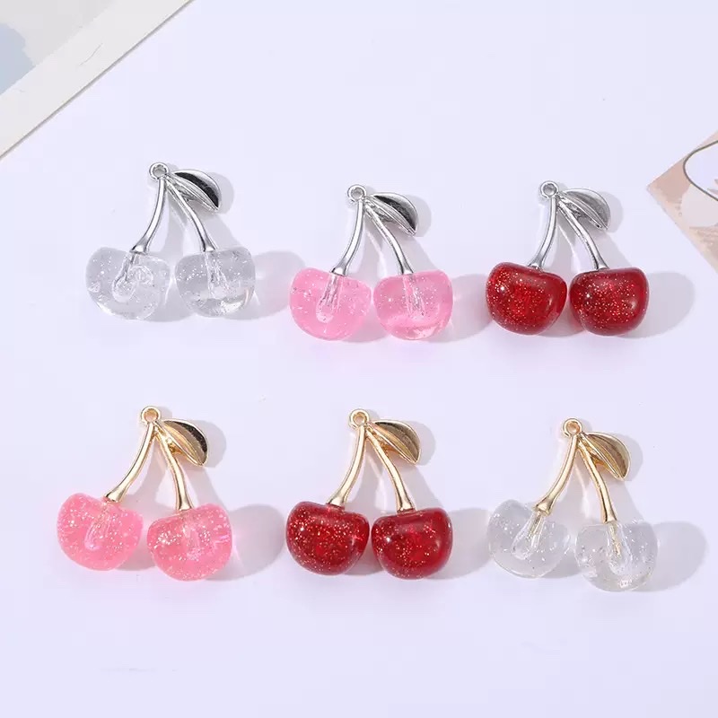 Alloy acrylic cherry pendants are available in multiple colors for DIY mobile phone chain hangers