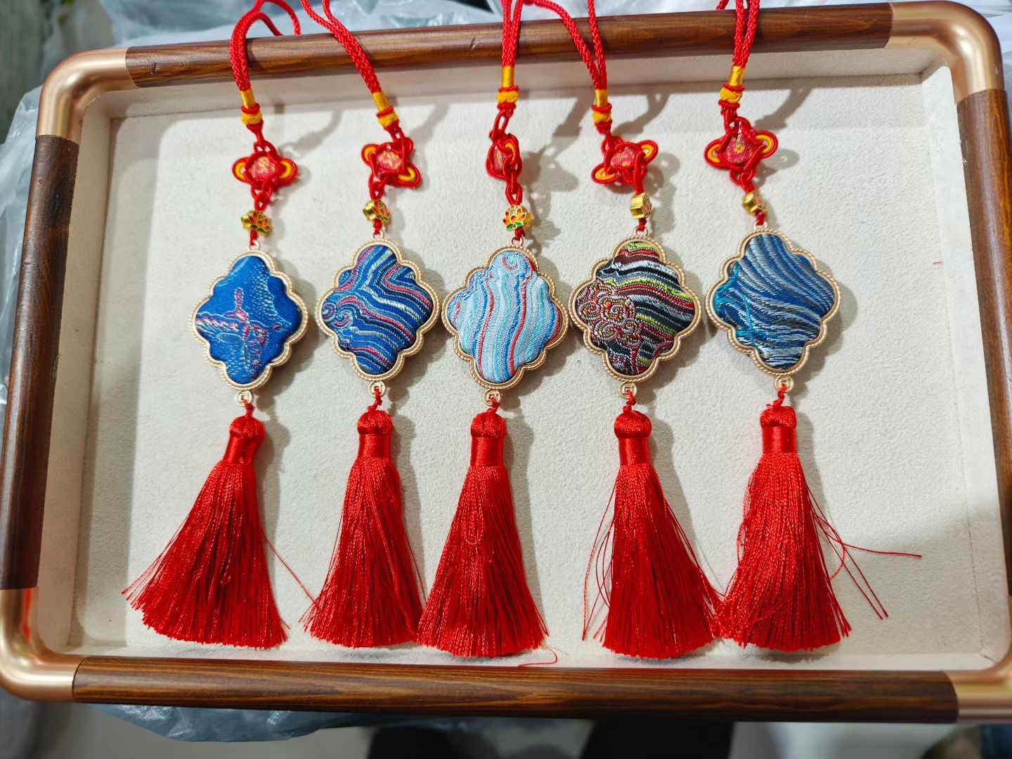 Song Brocade bag pendants, new Chinese-style hanging ornaments, handcrafted accessories, pendants, multiple choices, fashionable matching gifts and promotional items, new trend bag pendants with Chinese style elements Application Scenario