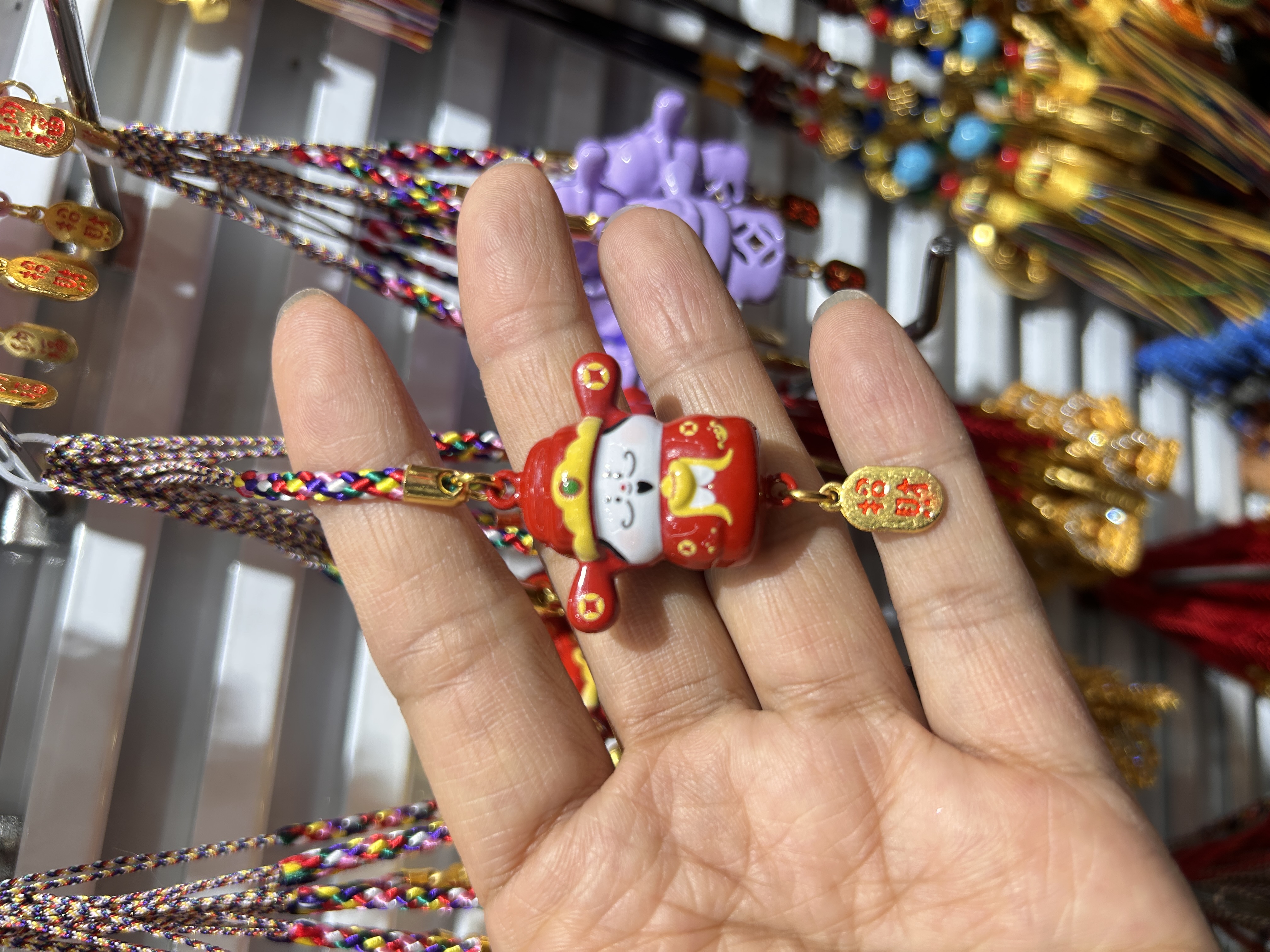 幻彩合金画油水音铃财神手机挂件，包挂件产品图