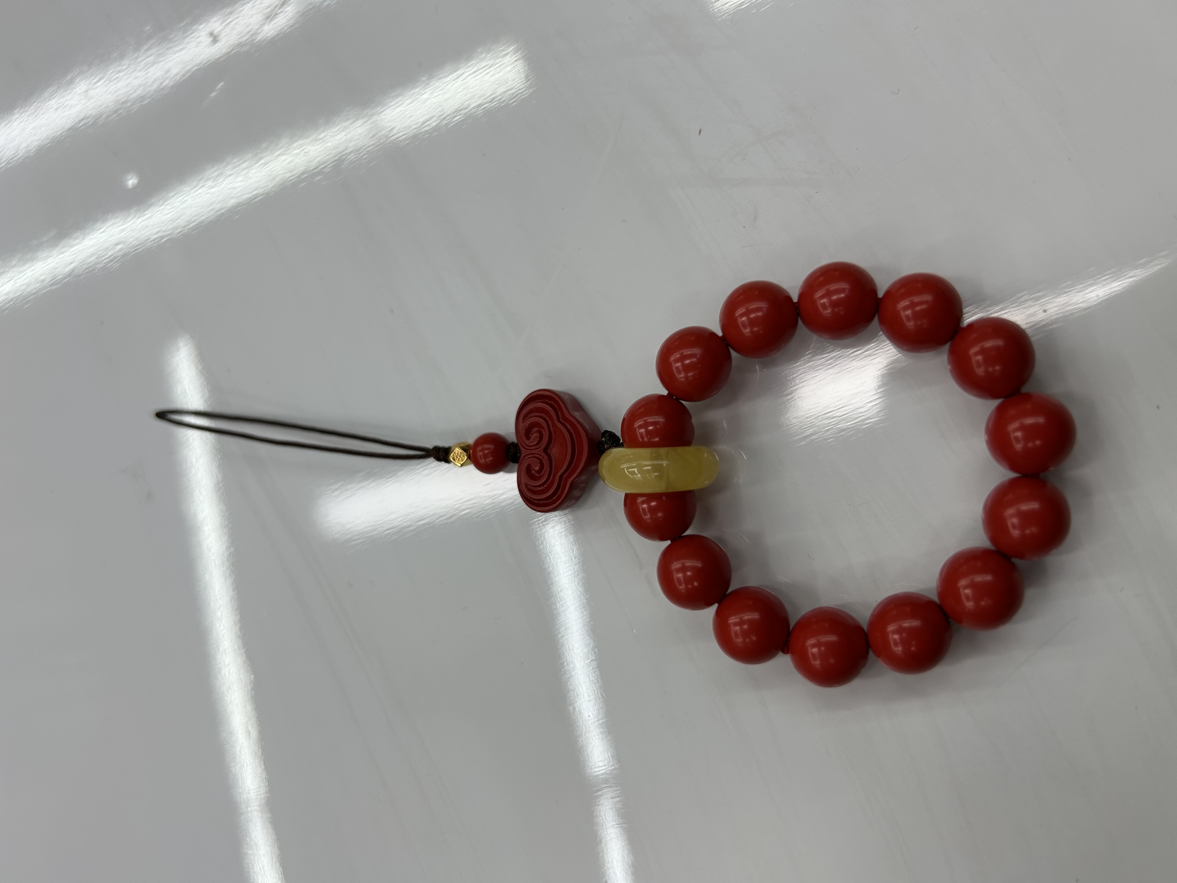 Natural cinnabar high-content red sand car, bag, mobile phone, wealth, peace and auspicious cloud gifts detail image 3