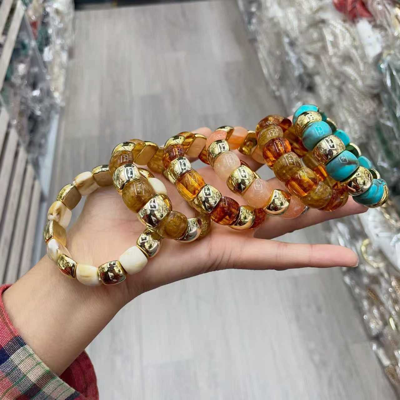 European and American fashionable acrylic bracelet, golden spliced curved tube bracelet, arc-shaped bamboo tube multi-color retro tinted bracelet for women Application Scenario