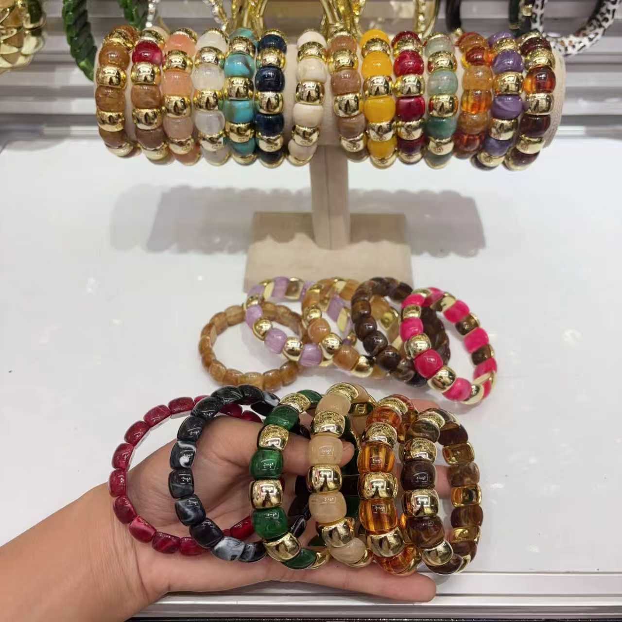 European and American fashionable acrylic bracelet, golden spliced curved tube bracelet, arc-shaped bamboo tube multi-color retro tinted bracelet for women details Picture