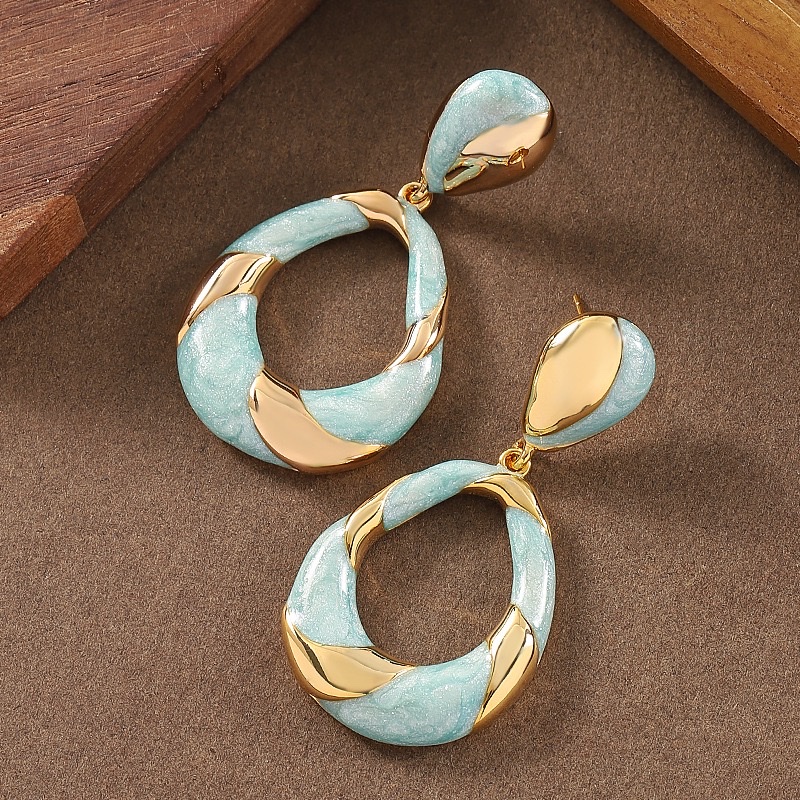 French-style artistic and retro mid-ancient style irregular oil-dripping geometric oval earrings, light luxury, niche and individual silver needle earrings details Picture