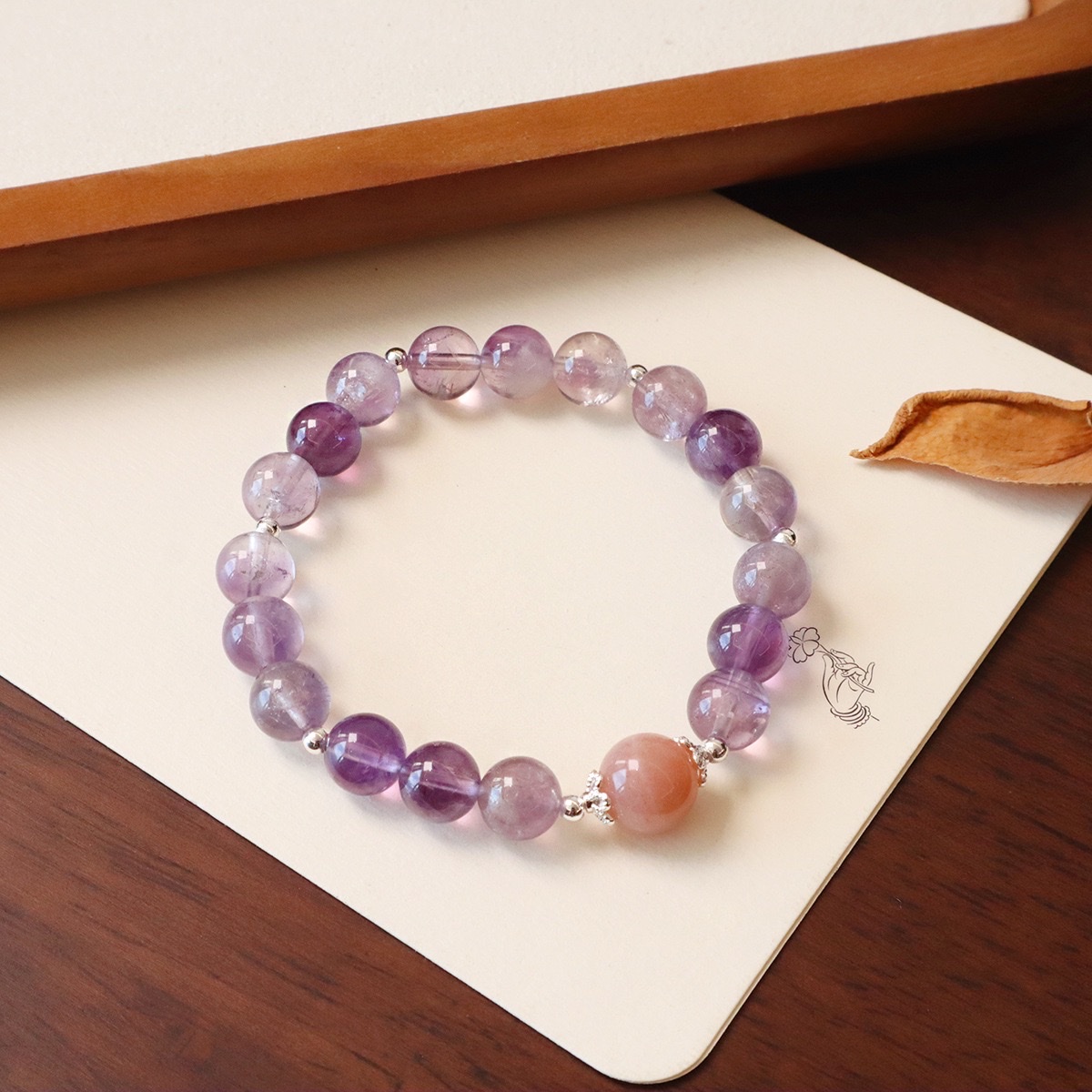 天然紫水晶手链搭配太阳石独特的设计形成一款简单设计的款式详情图3