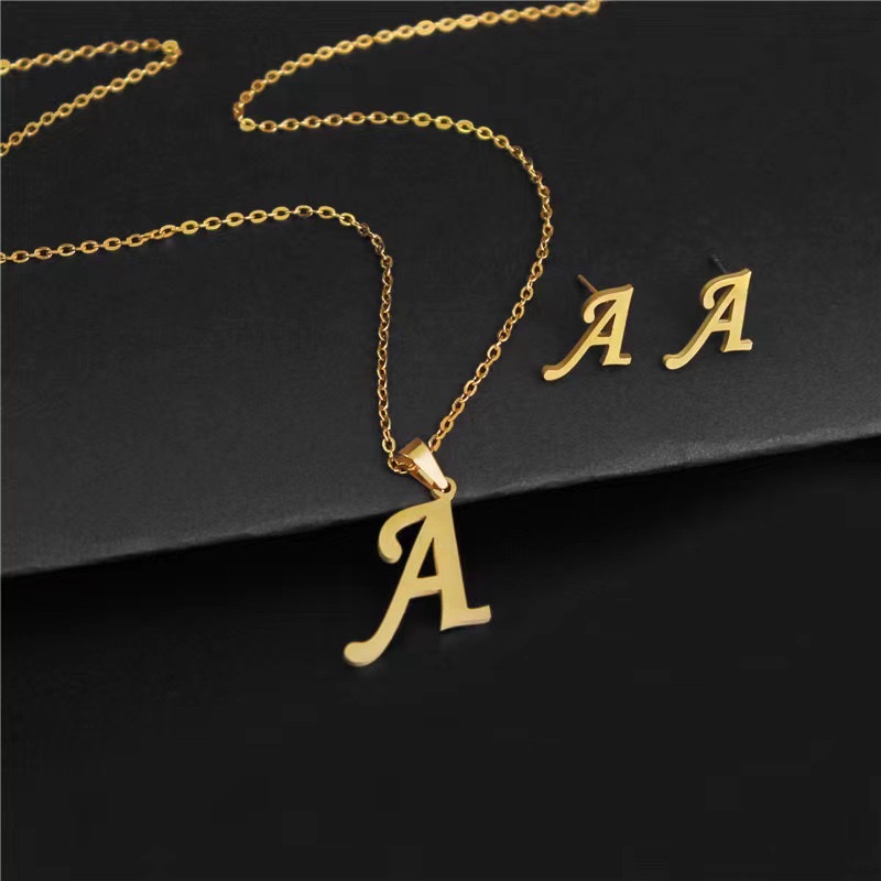 European and American cross-border fashion personality 26-letter stainless steel color-preserving pendant necklace earring set http://detail.m... com/page/index.htm? offerId=970919460526 details Picture