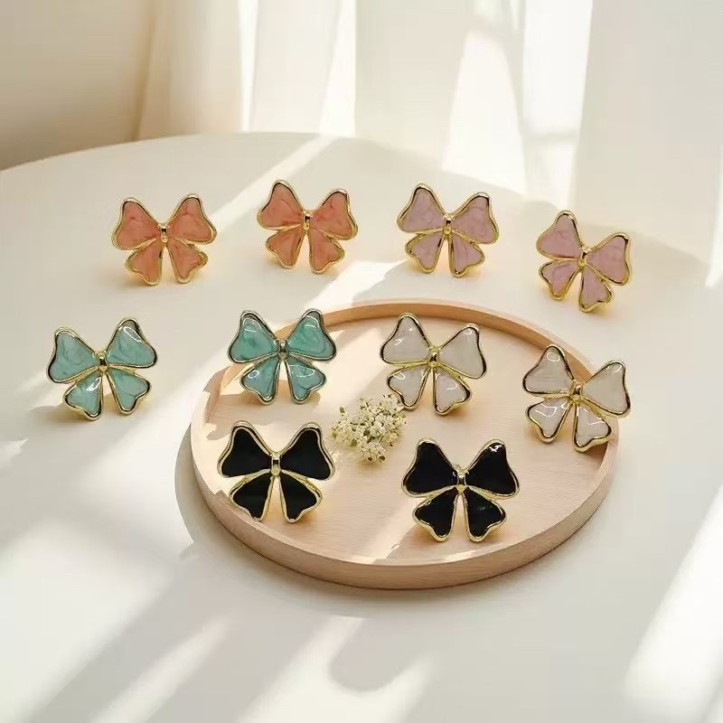 Fashionable oil ear stud earrings, stainless steel five-pointed star bow, dazzling, simple and elegant, women's ear stud accessories, versatile and trendy accessories Specification image