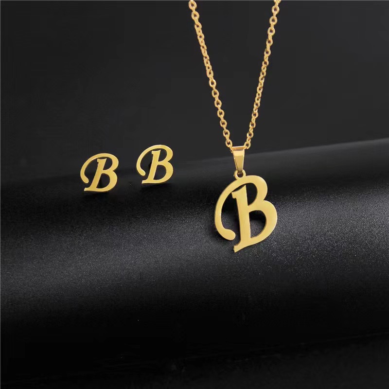 European and American cross-border fashion personality 26-letter stainless steel color-preserving pendant necklace earring set http://detail.m... com/page/index.htm? offerId=970919460526 Specification image