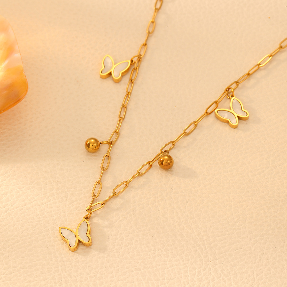 Cross-border stainless steel five-leaf flower heart-shaped butterfly necklace, European and American color preservation butterfly shell steel ball light luxury necklace for women Item Picture