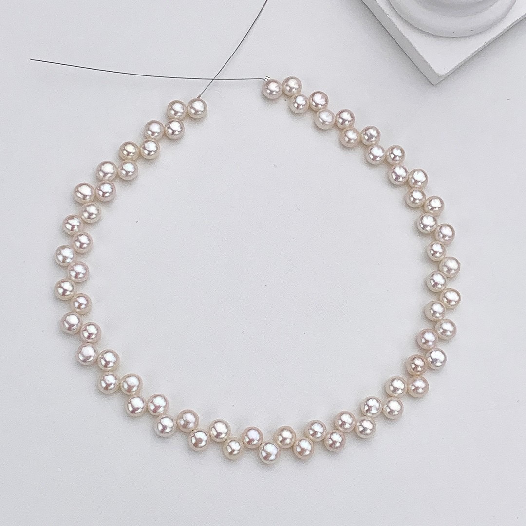 Strong light 7.5-8mm steamed bun beads, 28 holes, natural freshwater pearls, flat and round bread beads, diy materials, handcrafted, wholesale factory direct sales, natural freshwater pearls, Korean style personality Application Scenario