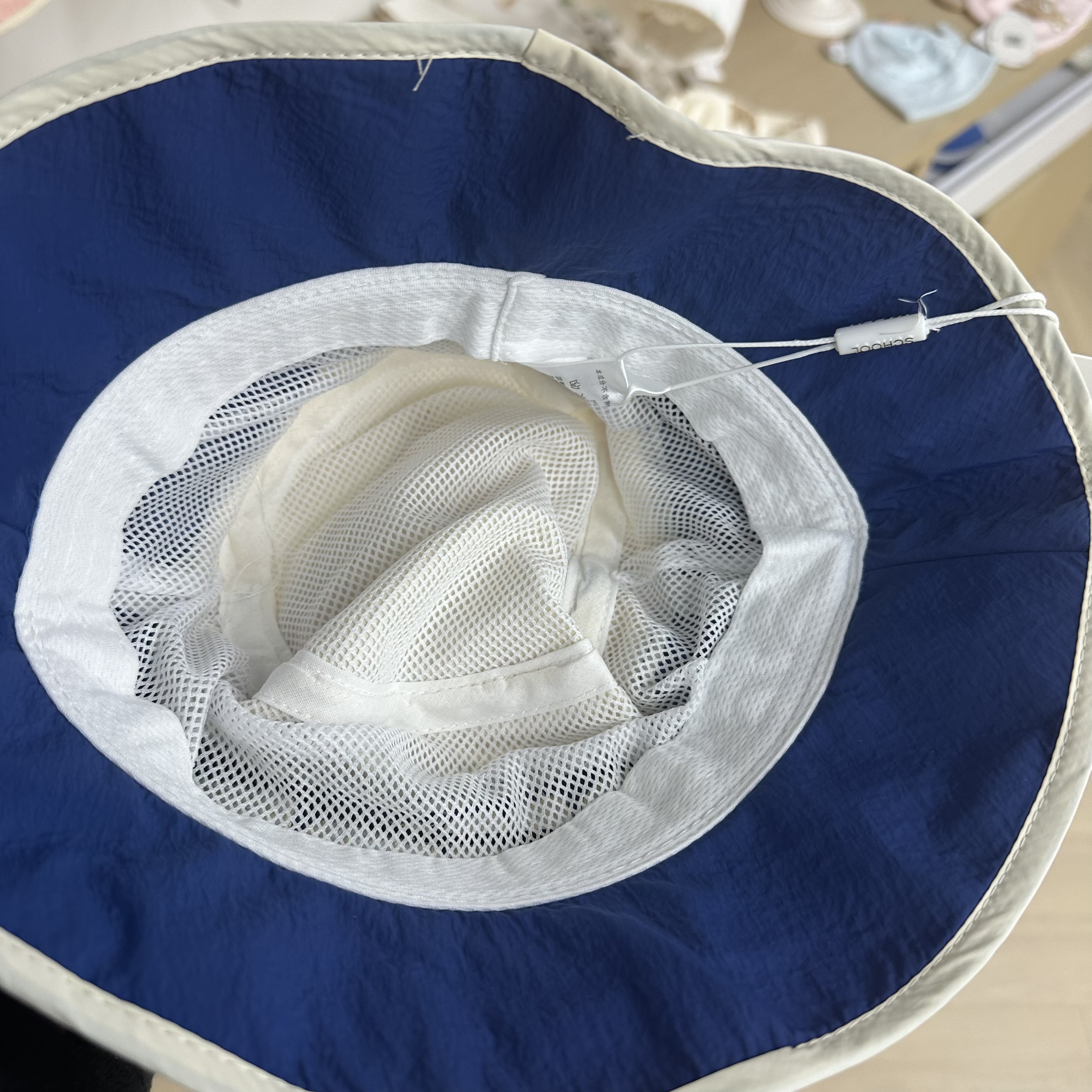 Suitable for children aged 5 to 15 in spring and summer, this is a fisherman's cap with a net strap, elastic and tight, and a sun protection cap Specification drawing