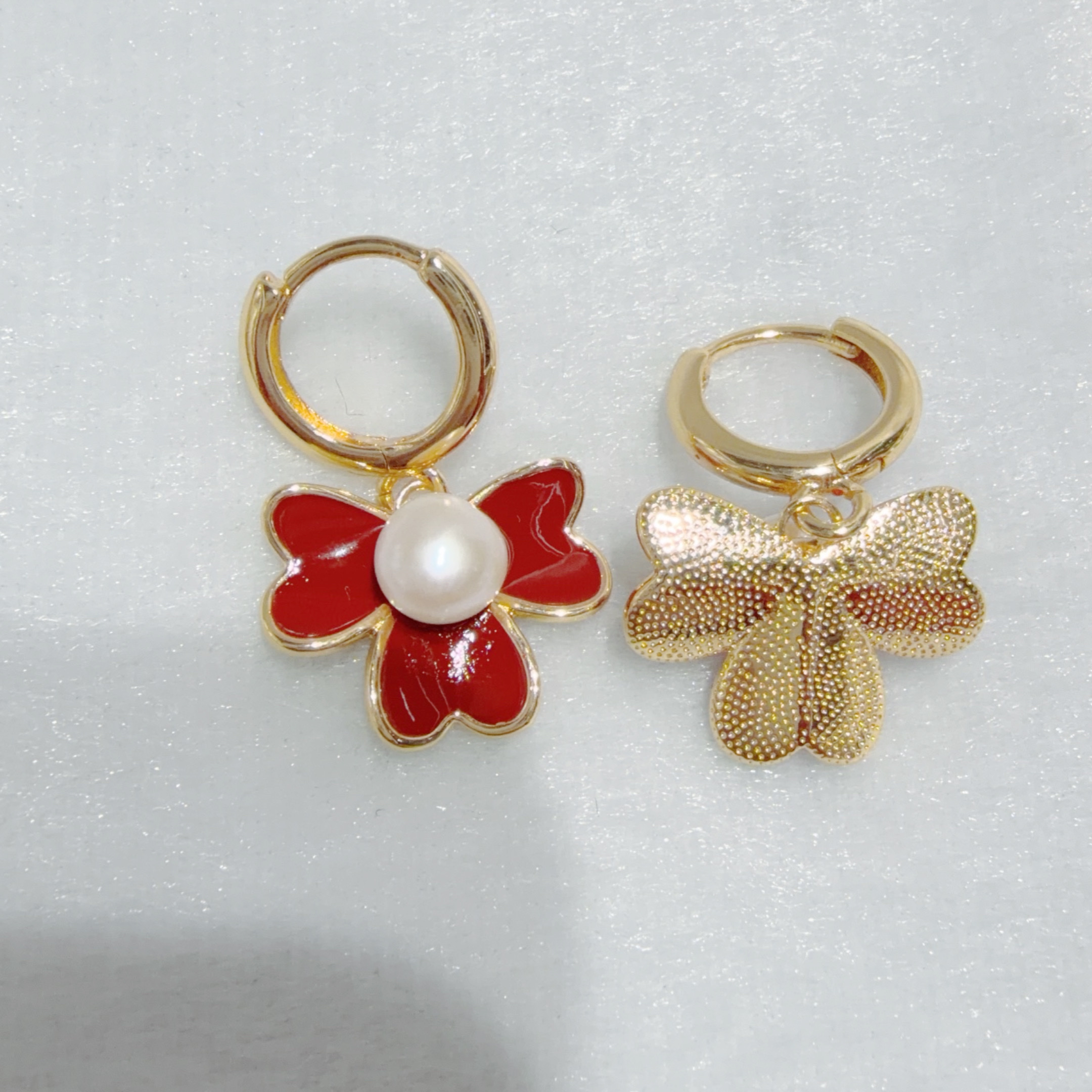 Weishiliya fashionable, versatile and elegant red clover pearl Earrings 8318 Application Scenario