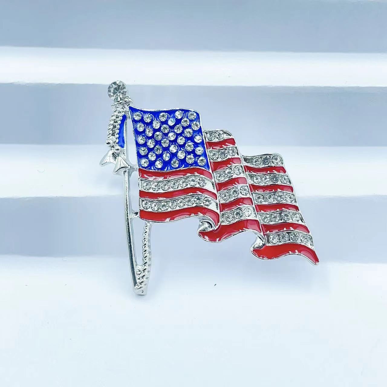 Wholesale of new European and American oil-dripping color diamond five-pointed star letter brooches, napkin rings and creative commemorative pins detail image 5