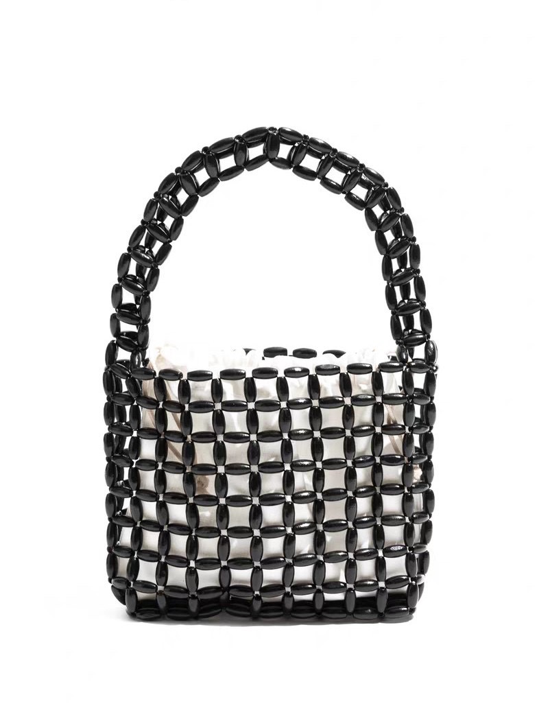 A new Instagram-style women's hand-held handbag with wooden beads and a hollowed-out design. It features a pure handcrafted beaded design in macaron color details Picture