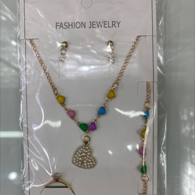 A set of four pieces: oil-painted heart, full diamond heart necklace, earrings, oil-painted heart bracelet and ring