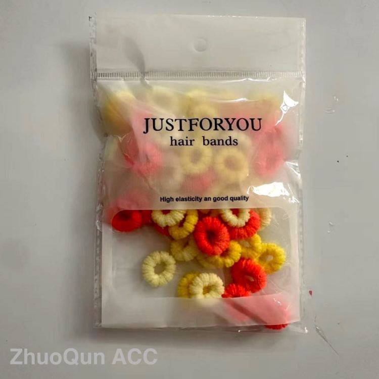 2026 Foreign trade 2.5-inch 0.2-gram, 50 pieces per bag for children's hair ties, girls' hair won't be hurt, baby towel loops have good elasticity Application Scenario