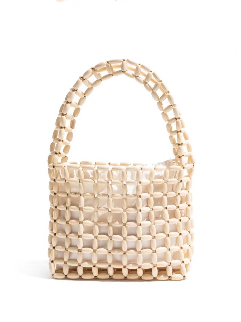 A new Instagram-style women's hand-held handbag with wooden beads and a hollowed-out design. It features a pure handcrafted beaded design in macaron color