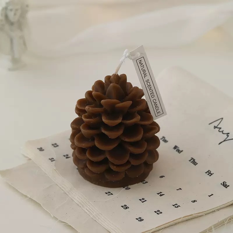 Cross-border wholesale of Christmas pineco-shaped scented candles, soybean wax scene decoration, and photo props detail image 4