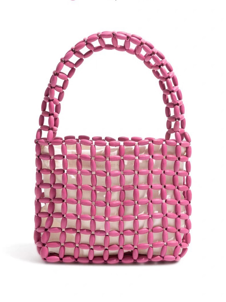 A new Instagram-style women's hand-held handbag with wooden beads and a hollowed-out design. It features a pure handcrafted beaded design in macaron color Application Scenario