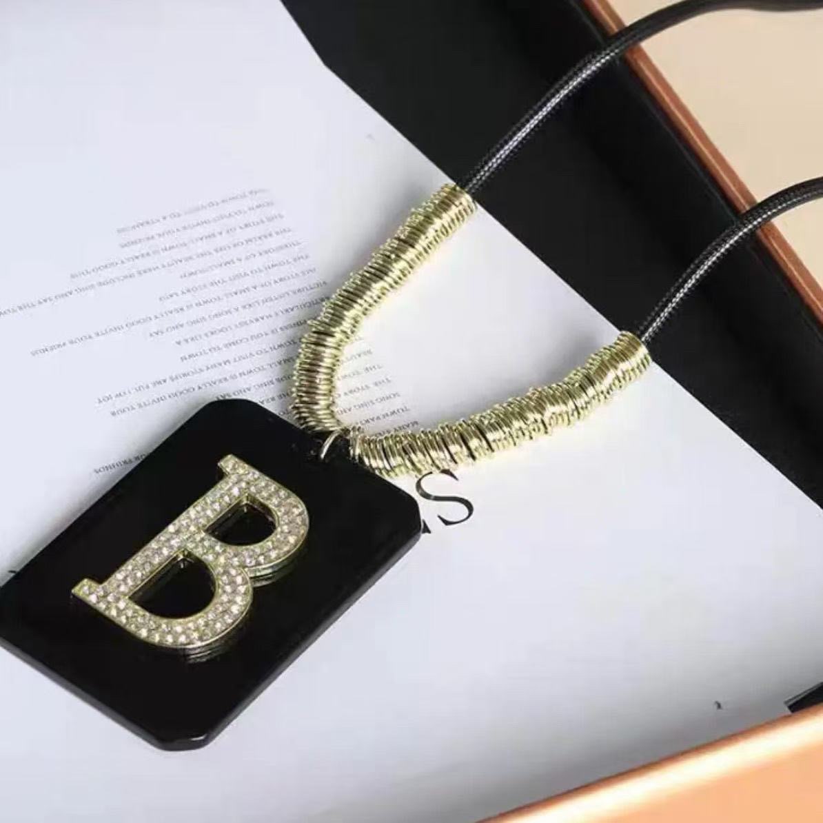 New long women's sweater style, popular leather rope chain letter pendant, popular passion blossom-style decorative necklace and accessory chain Application Scenario