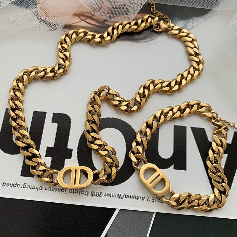 A golden thick chain letter titanium steel necklace by a popular Instagram influencer in Europe and America, a short collarbone chain with a hip-hop personality for women and a versatile bracelet details Picture