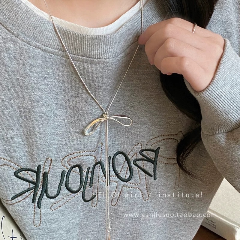 Silver bow tassel necklace for women's autumn and winter long pull-up sweater chain, light luxury and high-end, simple and versatile accessory Specification image