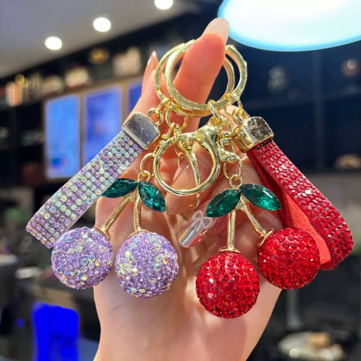 Amazon's best-selling cute and realistic water diamond cherry keychain, a baby car bag pendant with a full diamond of clay and cherries detail image 1