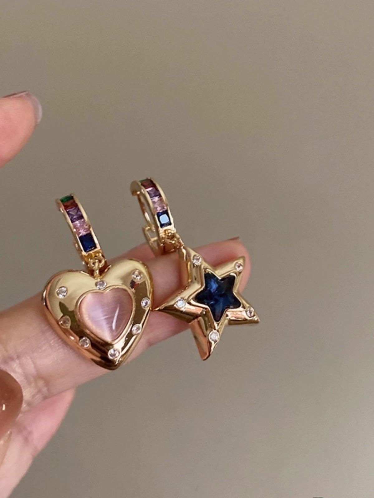 The AB style ear rings with colorful zircon hearts and five-pointed stars are fashionable, simple and elegant