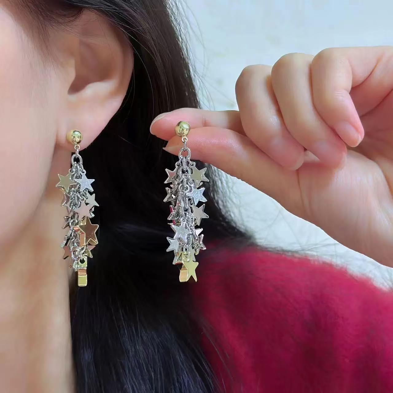 The unique, niche, exquisite and high-end style of the color-blocking double-combination starry sky tassel necklace earrings and collarbone chain trend