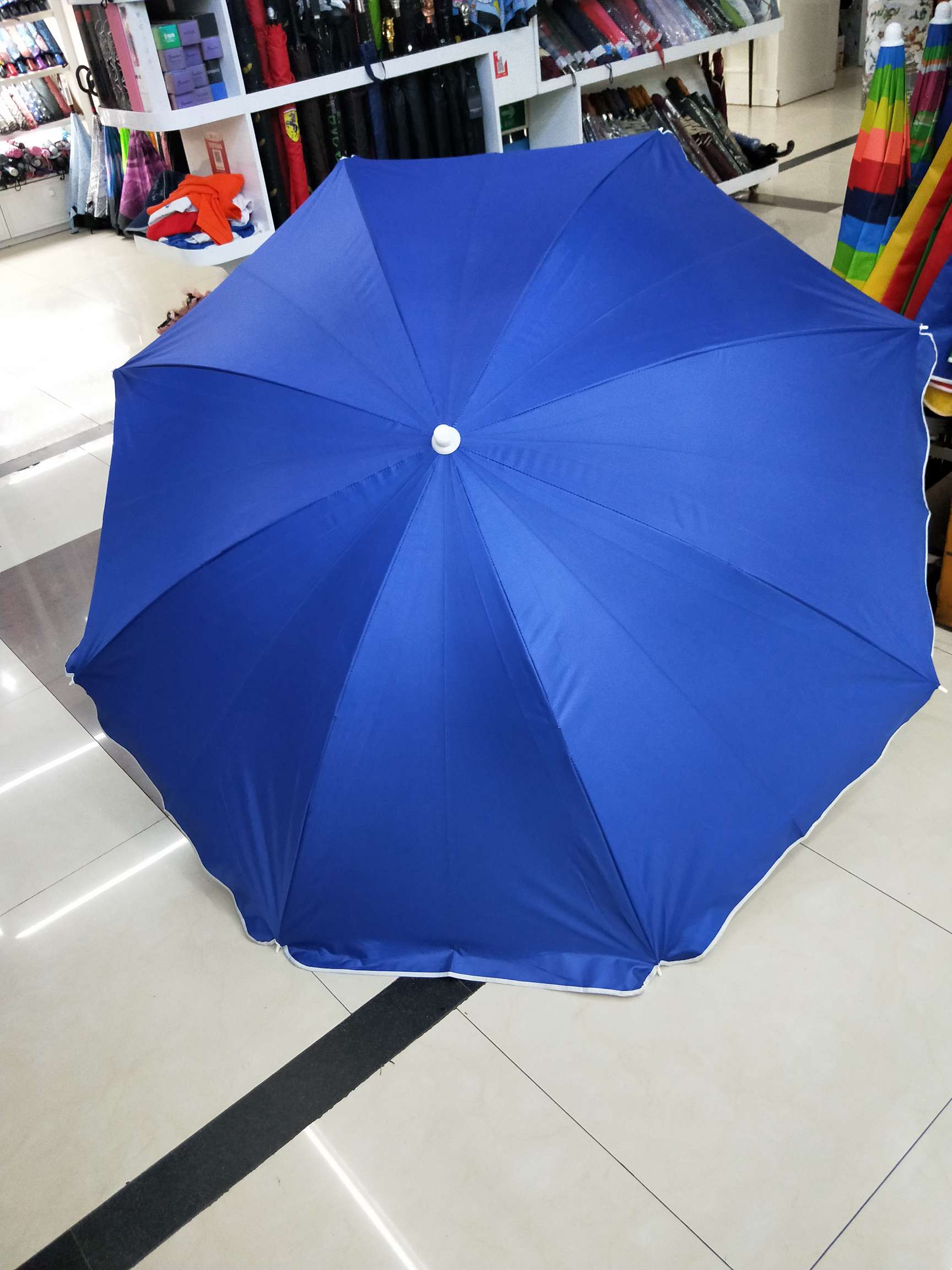 蓝色色丁长柄伞24骨雨伞定制一次性雨伞