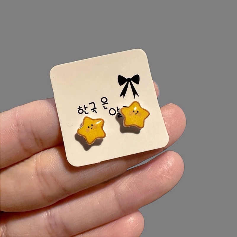 Cute and unique yellow star-shaped ear studs with a distinctive design, sweet and versatile dopamine earrings for summer detail image 2