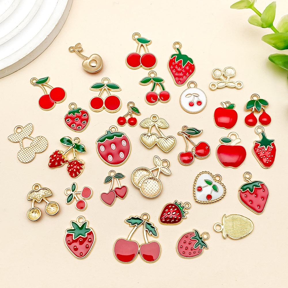 diy jewelry accessories, fruit simulation alloy pendants, cartoon illuminated football keychains, plush figurines, creative small items, gifts details Picture