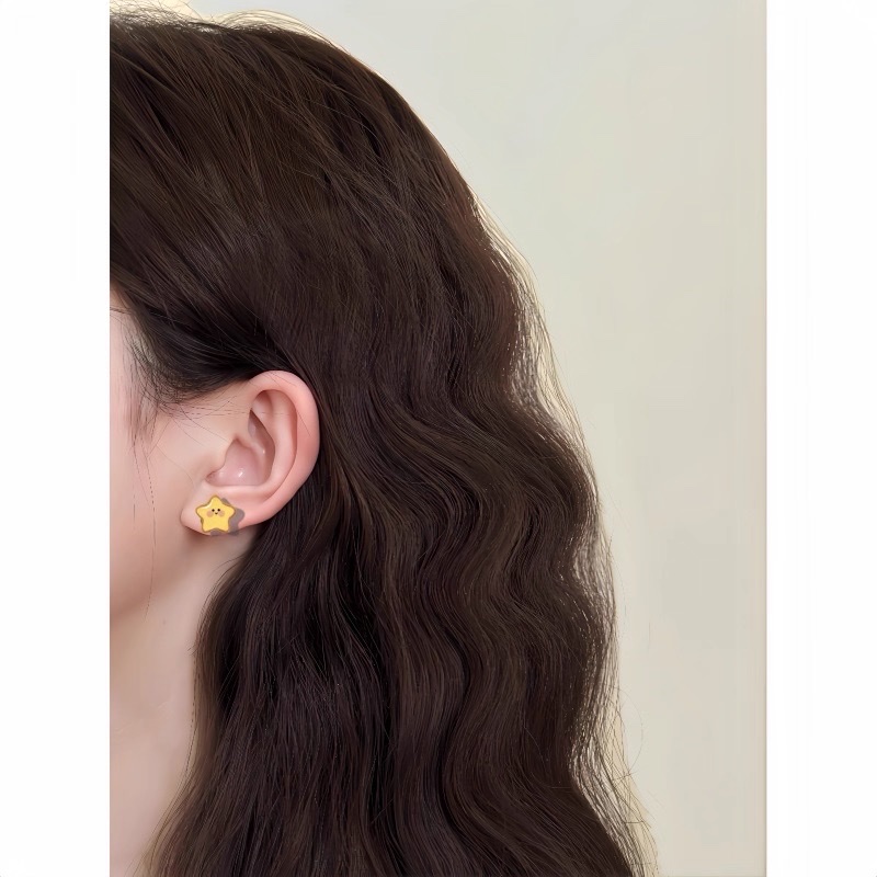Cute and unique yellow star-shaped ear studs with a distinctive design, sweet and versatile dopamine earrings for summer detail image 3