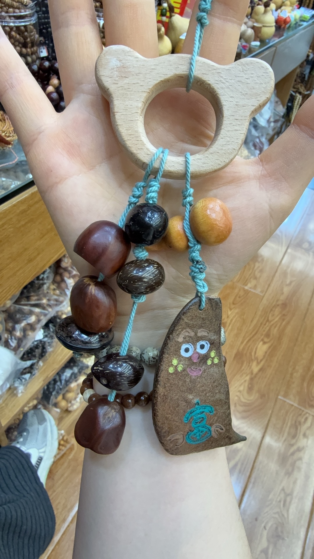 时尚包包挂链手机链女款短款配件果壳娃娃新品服饰百搭潮流抖音热门款支持一件代发风铃天然款产品图