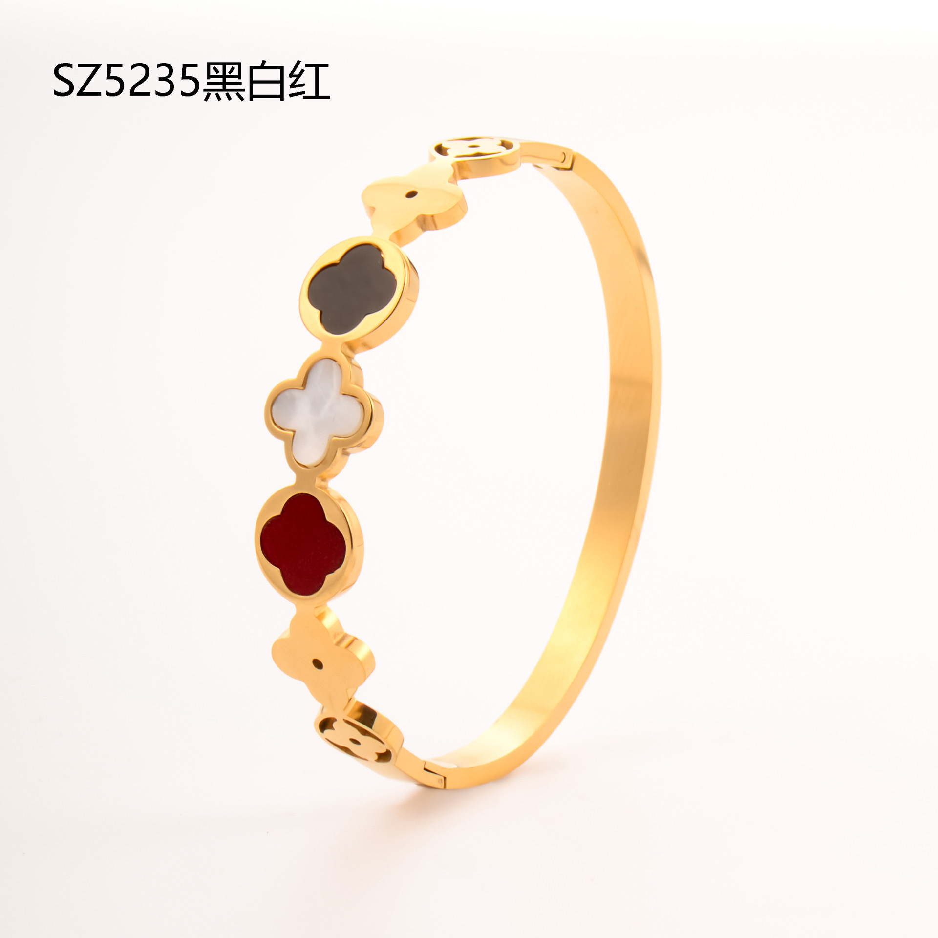 Factory direct supply of stainless steel gold-plated bracelet, red enamel four-leaf clover series diamond-encrusted hollow titanium steel bracelet jewelry detail image 4