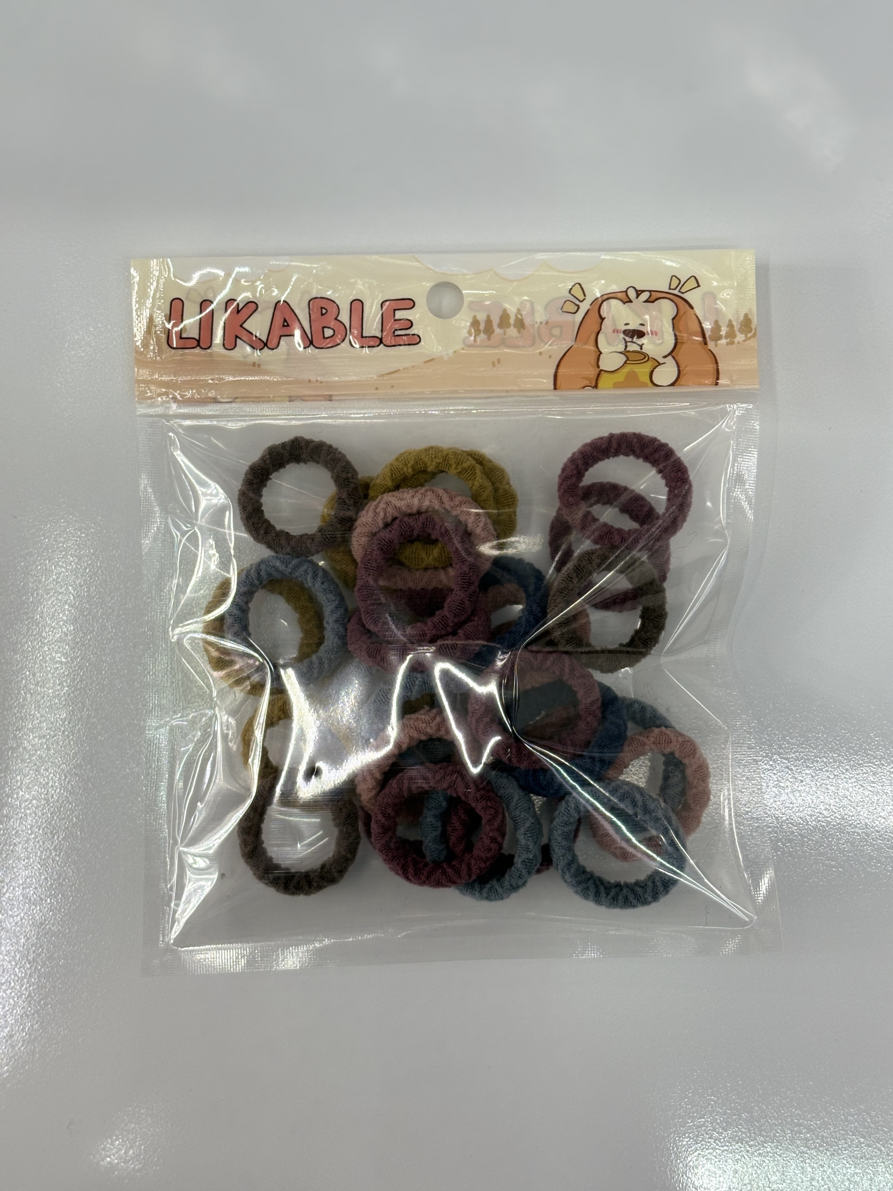 New cartoon creative hand-held bag children's towel ring hair accessory, 25 pieces of high-elasticity towel ring hair tie Application Scenario