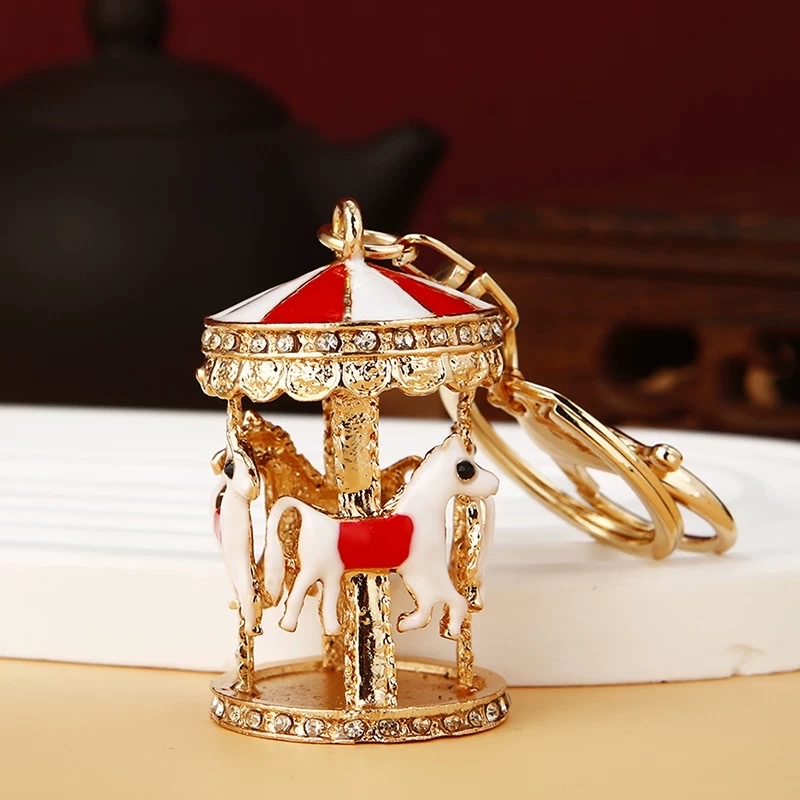 Creative diamond-encrusted carousel car keychain, cute female bag pendant, exquisite key chain ring Specification image