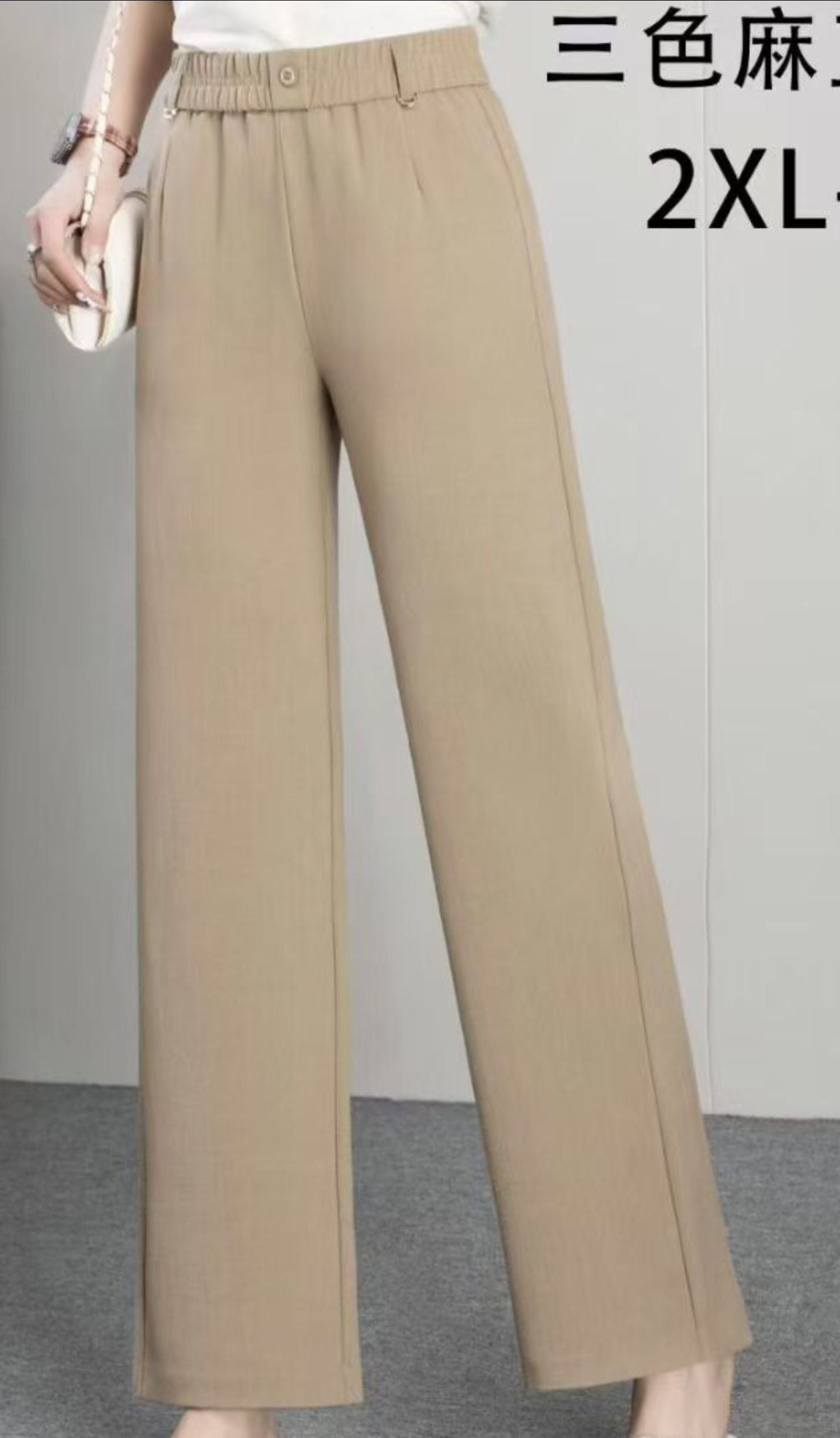 The 2026 Spring and autumn women's trousers are fashionable and trendy straight-leg pants with elastic waists and khaki color details Picture