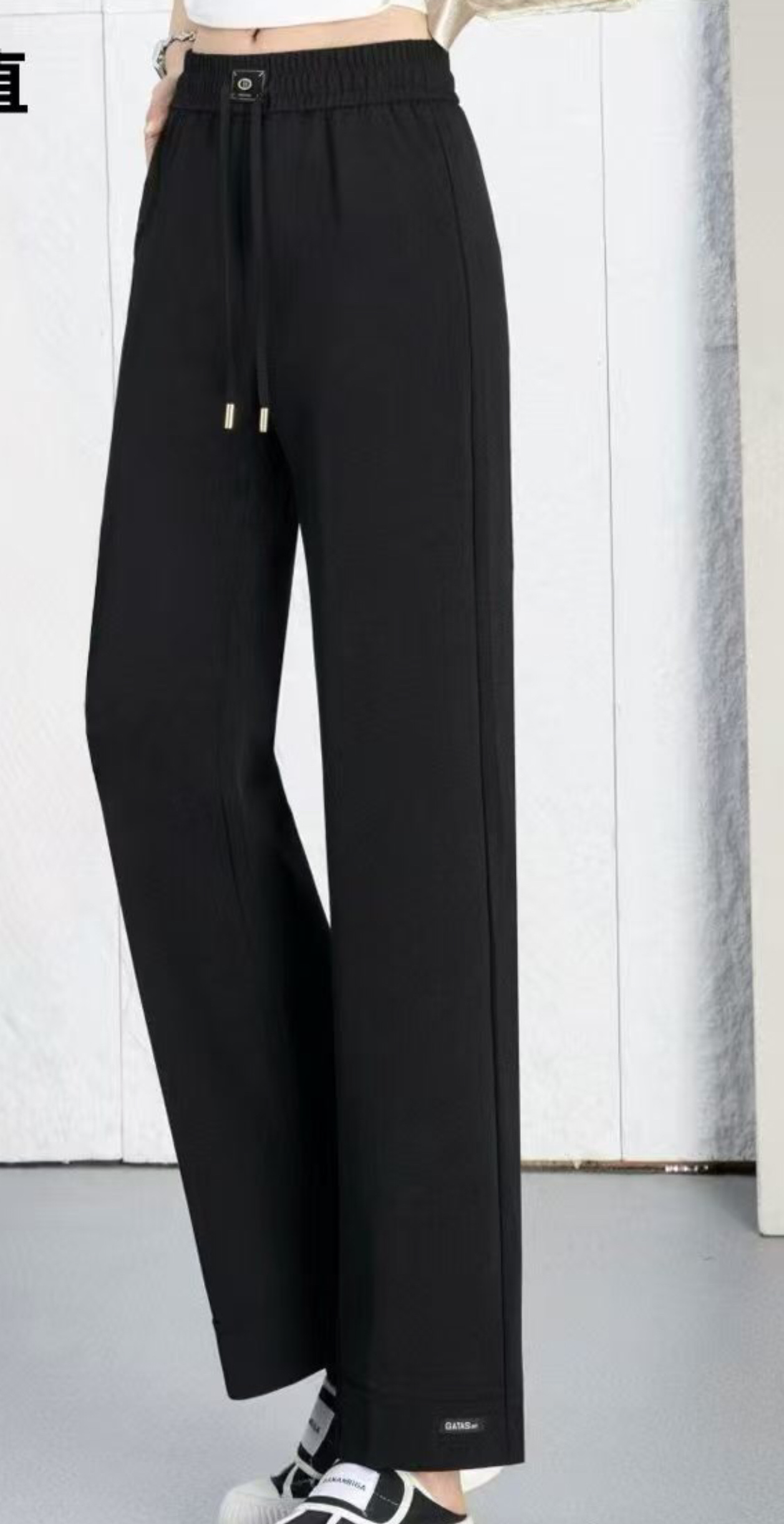 For the Spring and autumn of 2026, there are fashionable and popular black long pants made of linen with a small straight leg and an elastic waist details Picture