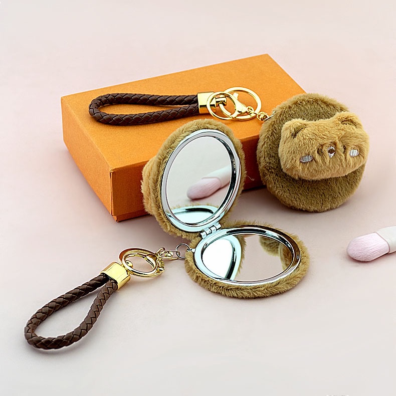 时尚便携式化妆镜 圆形手绳钥匙扣化妆小镜子 可折叠旅行补妆神器细节图