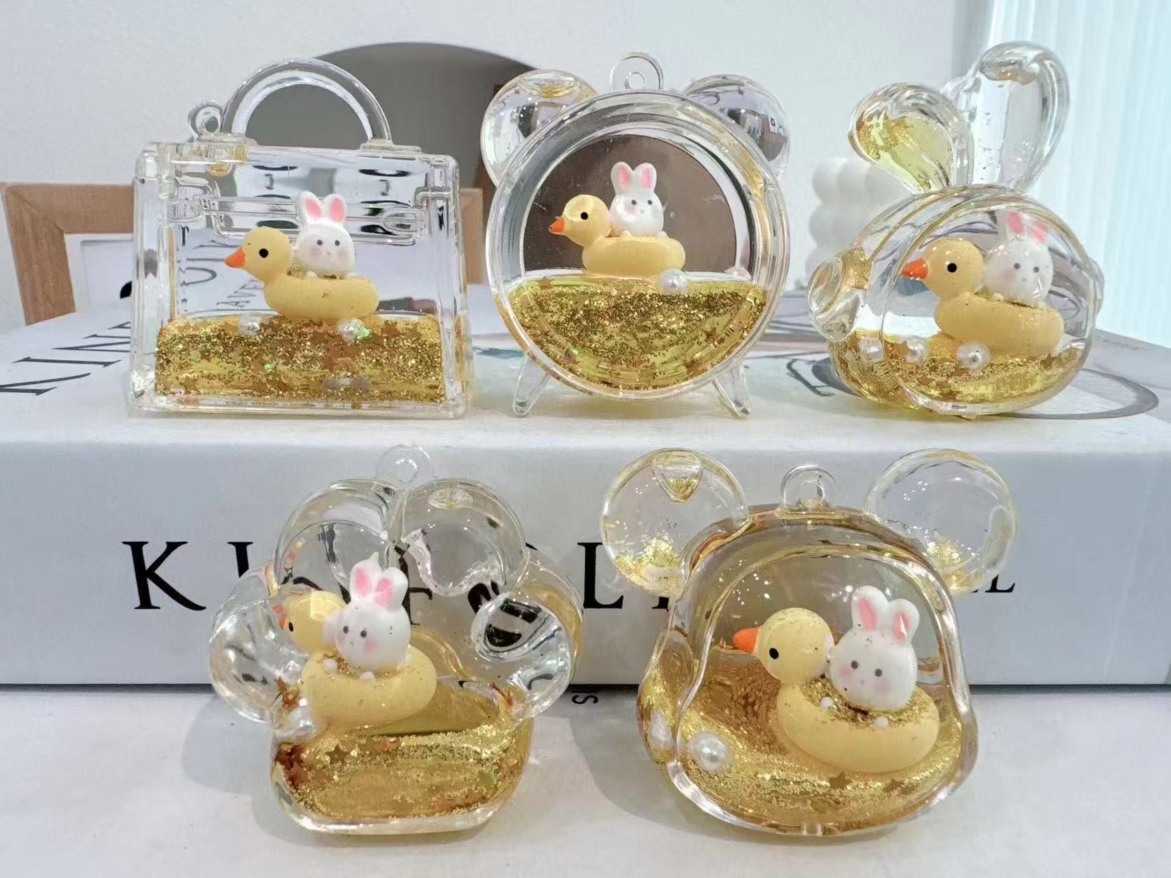 钥匙扣/卡通钥匙扣挂件/钥匙扣公仔挂件/宋锦/流沙入油玩具细节图