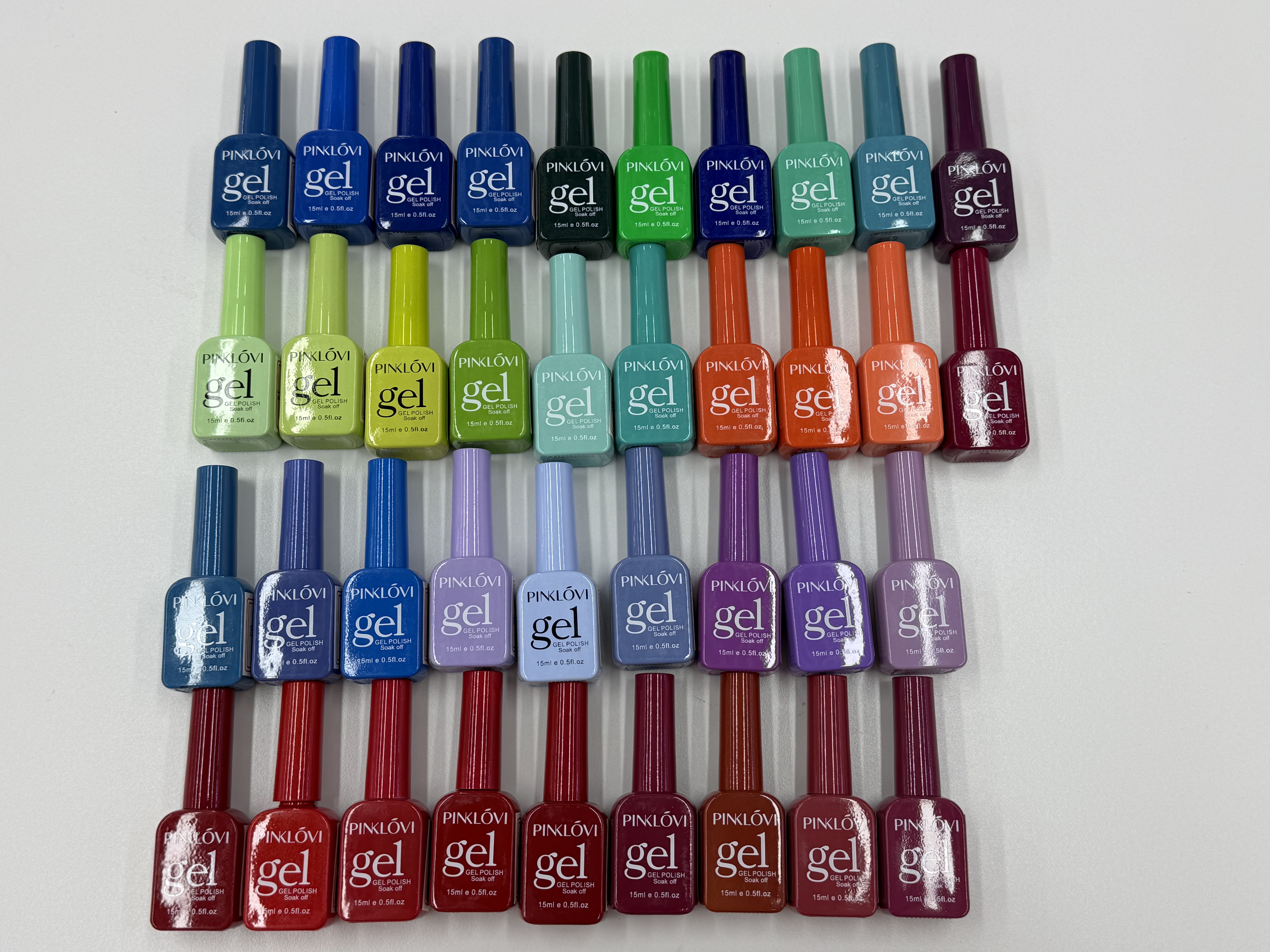 A complete set of a new bottle of one-color nail polish gel in a popular color and solid color for nail art Specification image