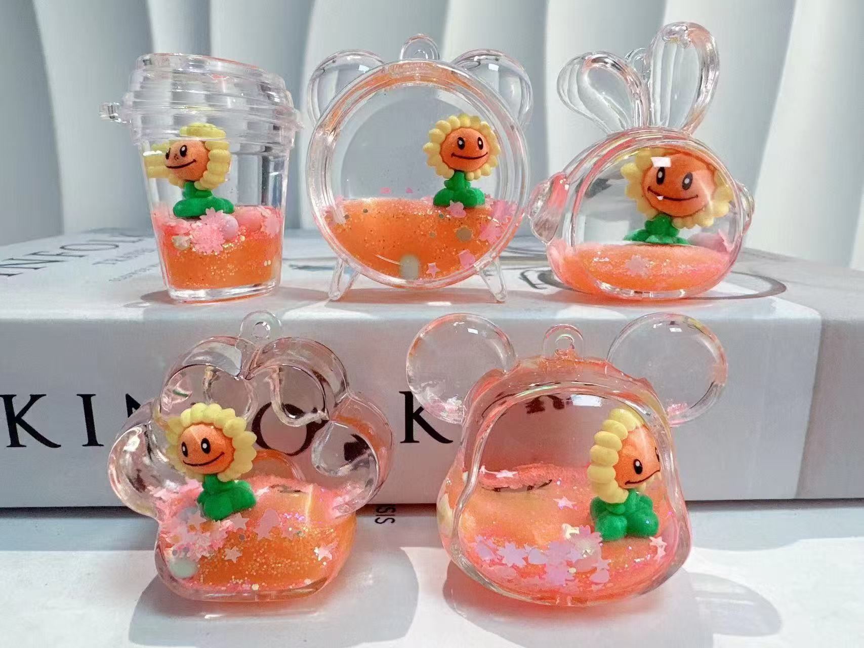 钥匙扣/卡通钥匙扣挂件/钥匙扣公仔挂件/宋锦/流沙入油玩具产品图