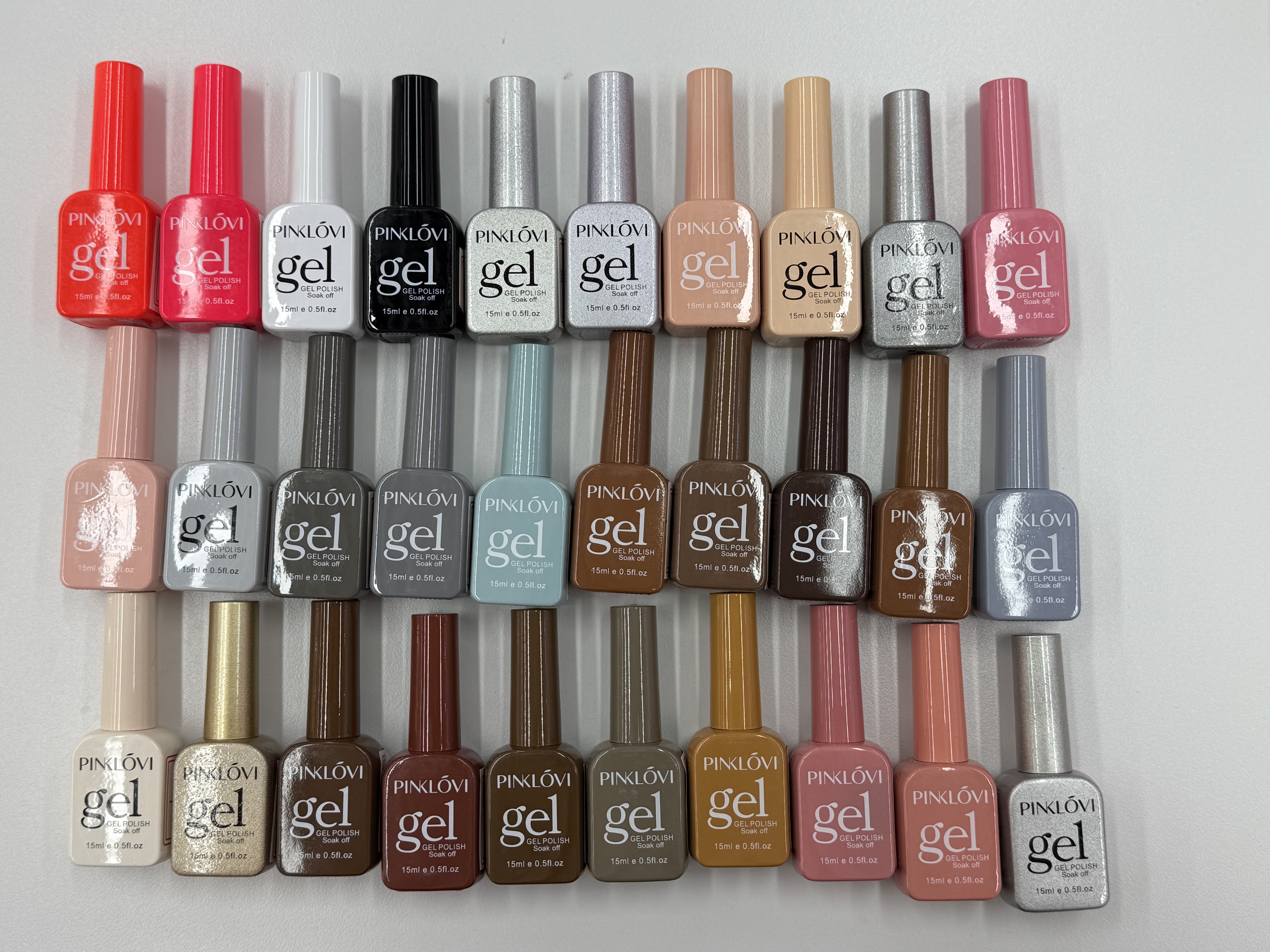 A complete set of a new bottle of one-color nail polish gel in a popular color and solid color for nail art details Picture
