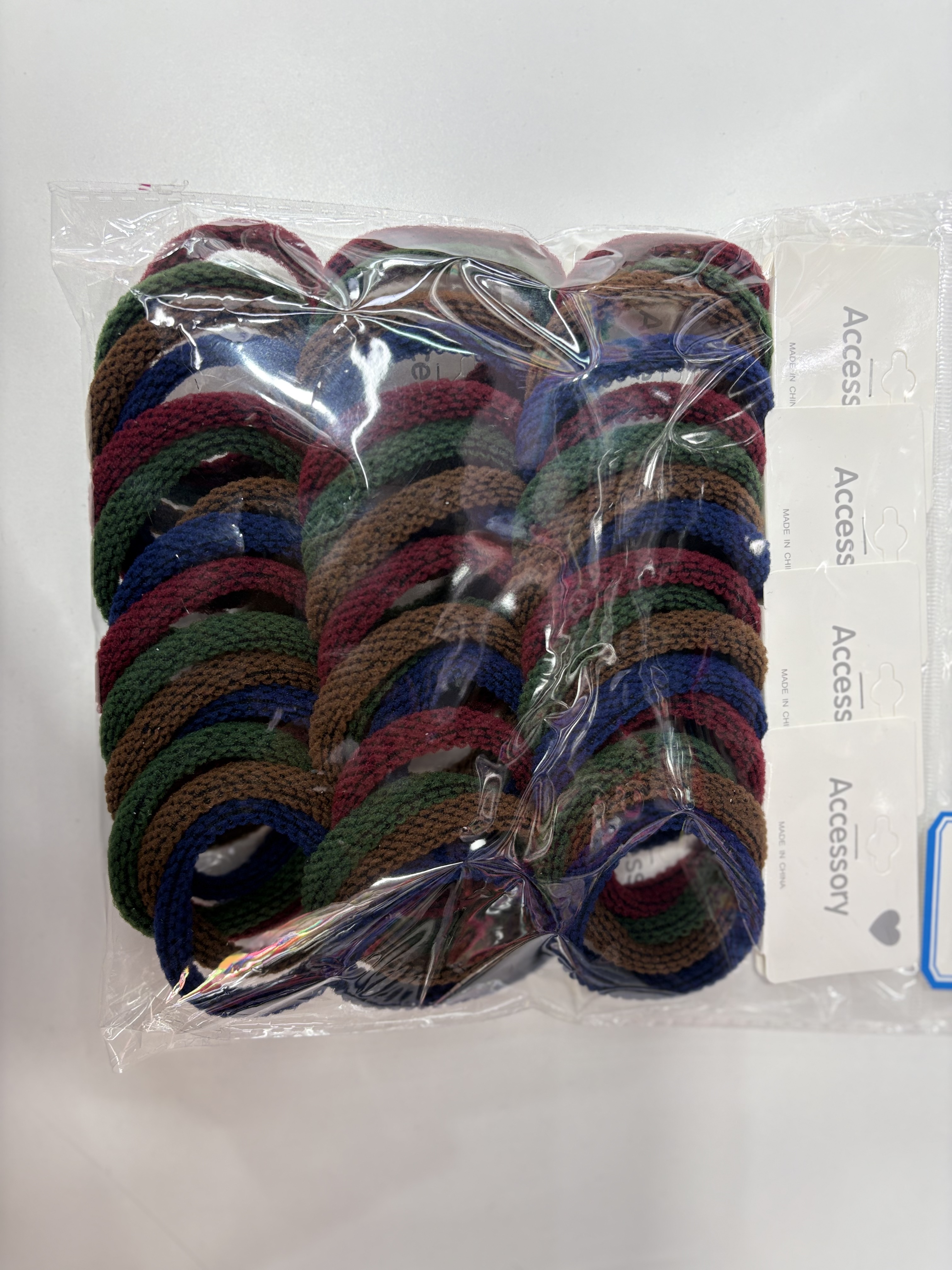 Four high-elasticity striped seamless hair bands, a high-end jacquard style tag headband bag, a dozen high-quality nylon towel bands detail image 7
