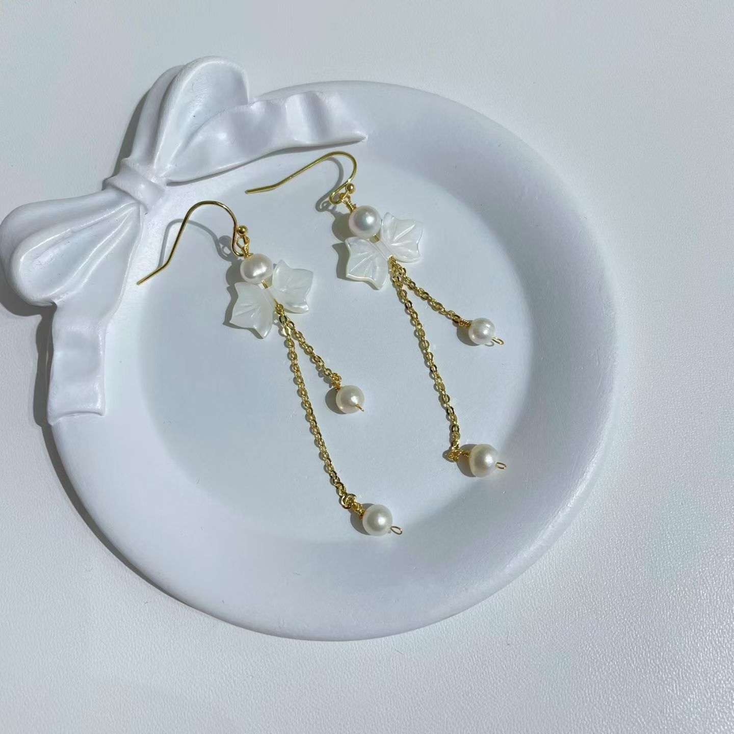 气质高级大气显瘦耳线女设计感蝴蝶结珍珠款流苏耳环耳钉独特耳饰