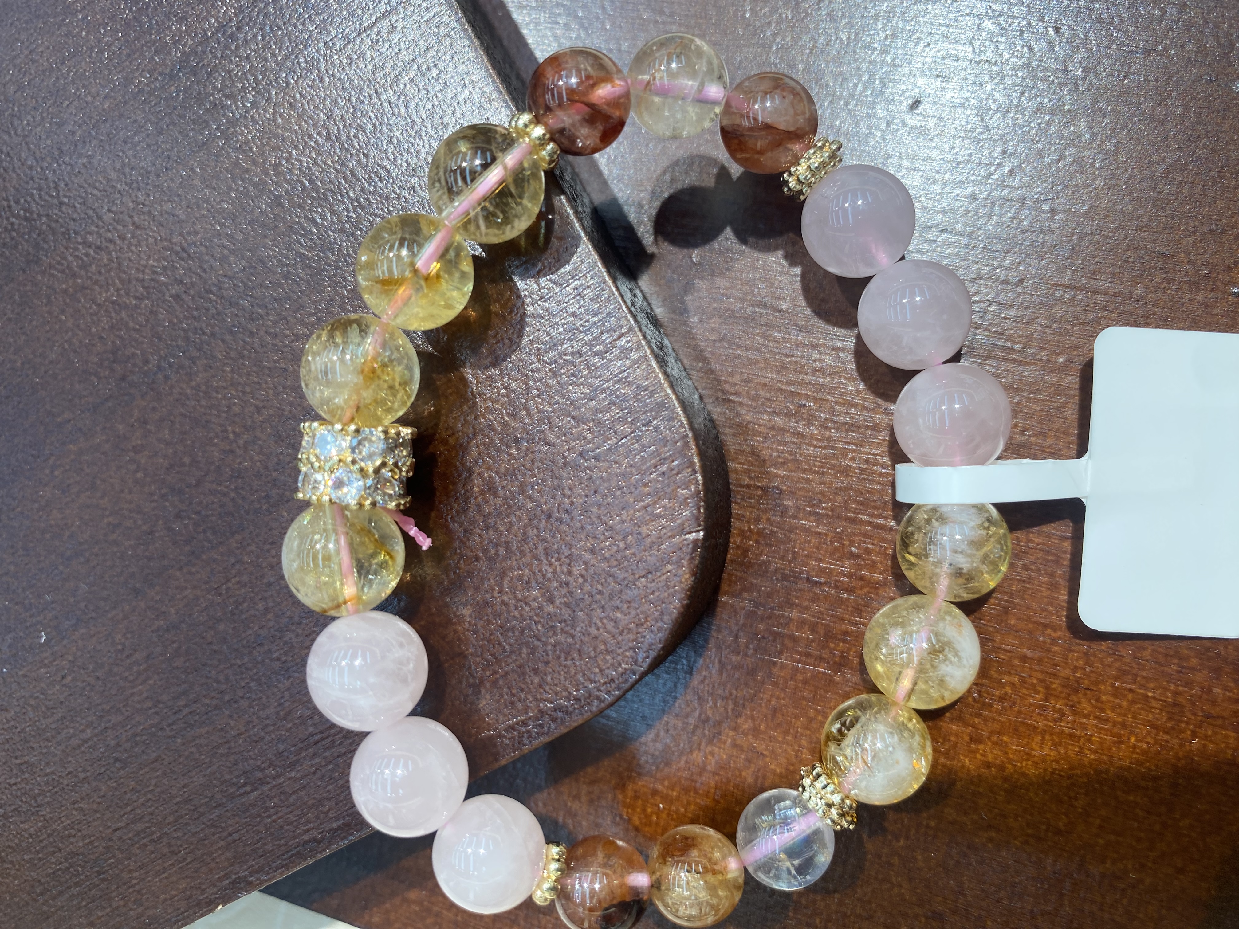 黄塔晶 粉水晶 红胶花细节图