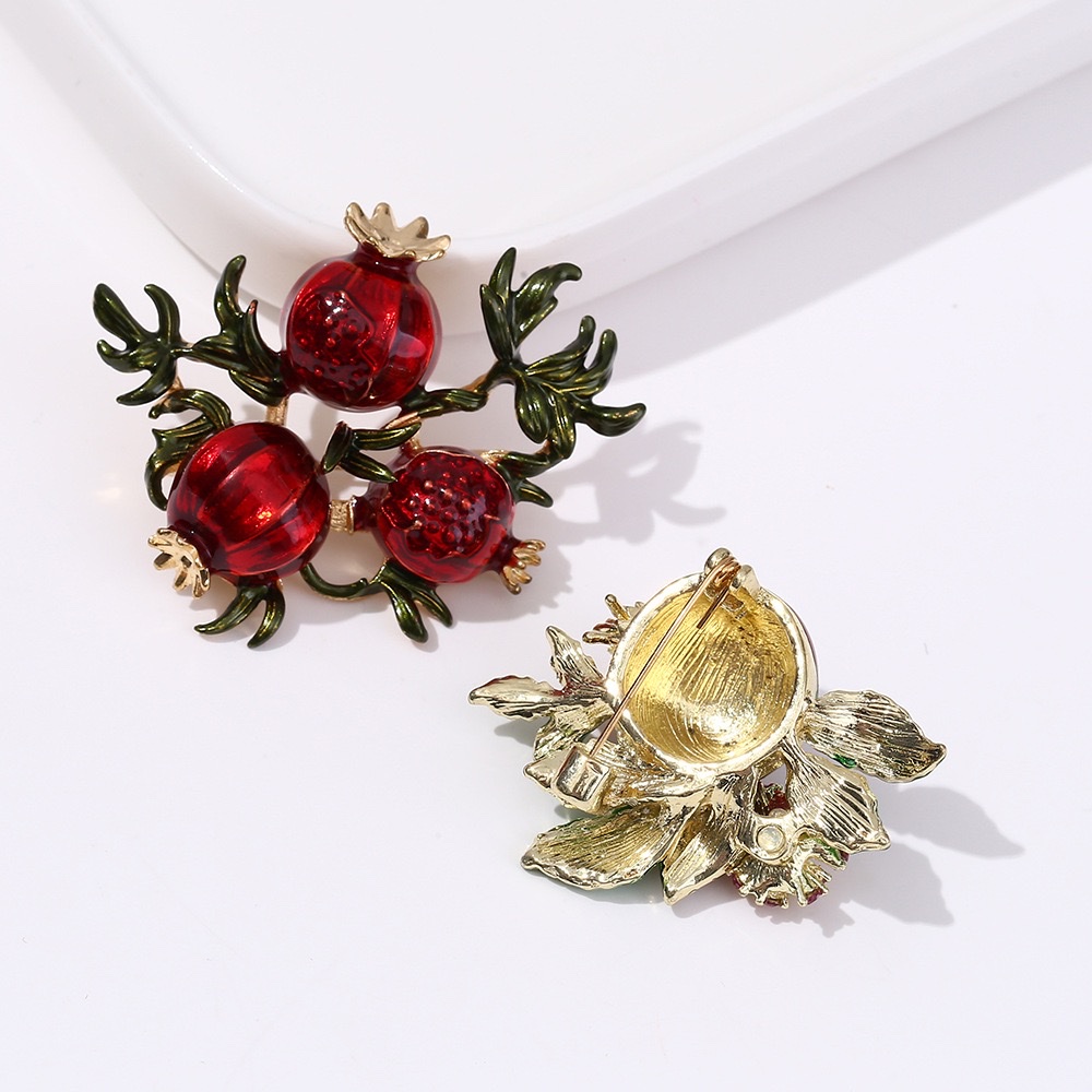Hot-selling pomegranate series brooches, eco-friendly European and American cross-border alloy pomegranate fruit and pomegranate flower brooches, clothing and accessories wholesale details Picture